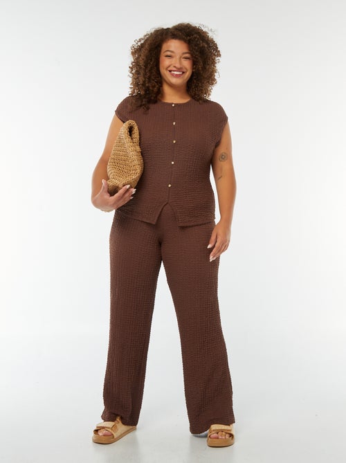 Pantaloni larghi in tessuto goffrato - Kiabi
