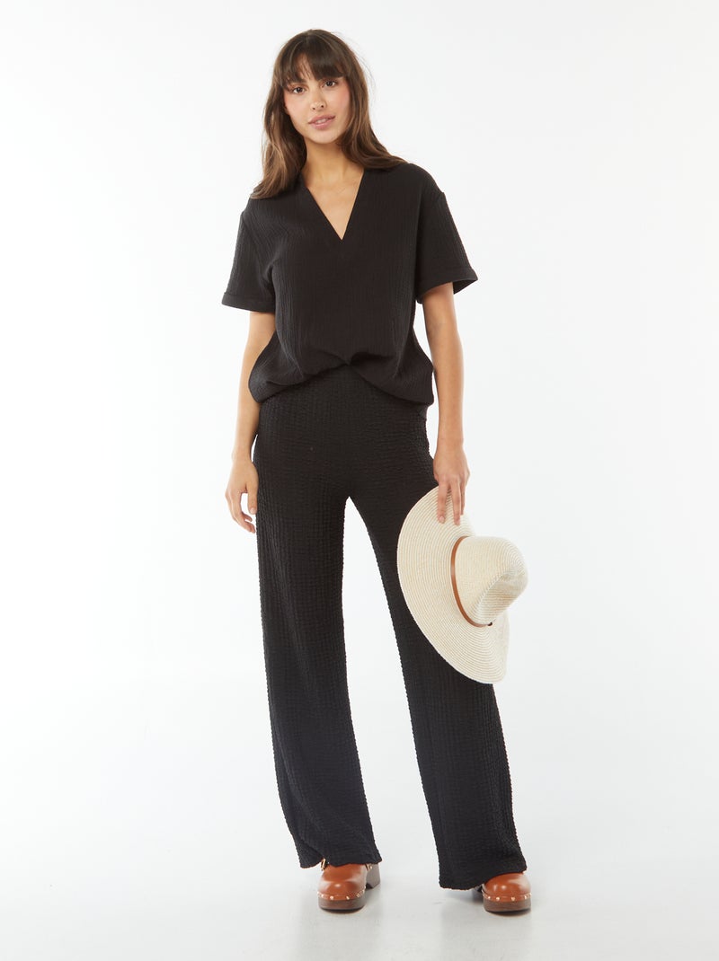 Pantaloni larghi in tessuto goffrato nero - Kiabi