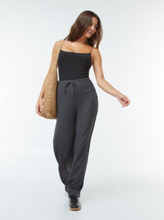 Pantaloni larghi in tessuto plissettato