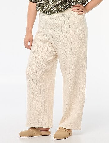 Pantaloni larghi in tessuto traforato