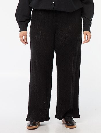 Pantaloni larghi in tessuto traforato