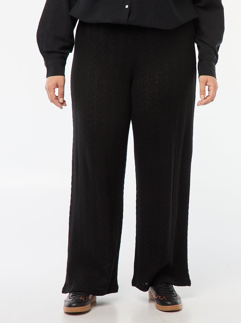 Pantaloni larghi in tessuto traforato nero - Kiabi