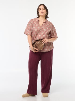 Pantaloni larghi in tessuto traforato