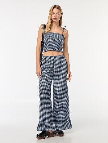 Pantaloni larghi vichy con volant