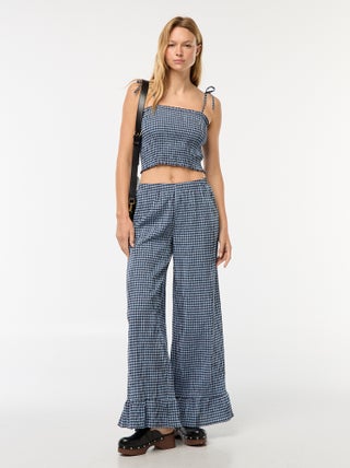 Pantaloni larghi vichy con volant