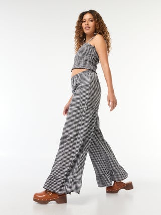 Pantaloni larghi vichy con volant