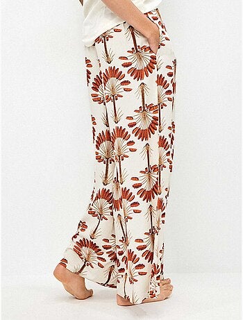 Pantaloni lunghi a gamba larga con stampa palme