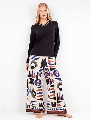 Pantaloni lunghi con motivi geometrici e bordi sul fondo