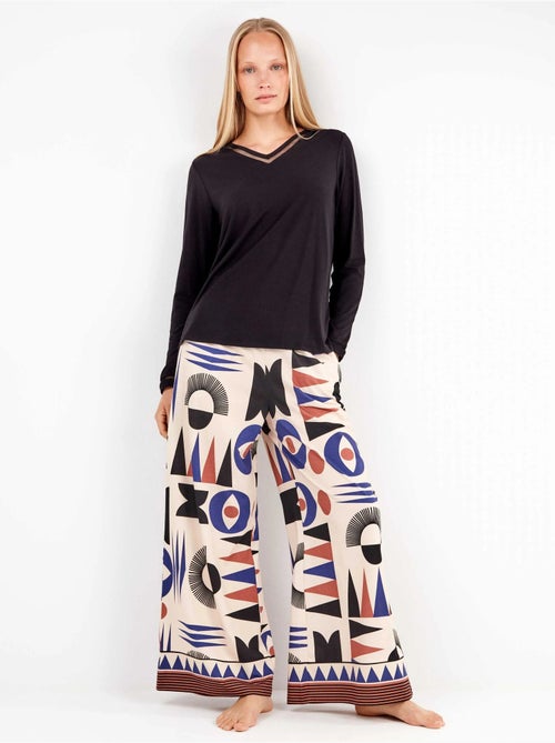 Pantaloni lunghi con motivi geometrici e bordi sul fondo - Kiabi