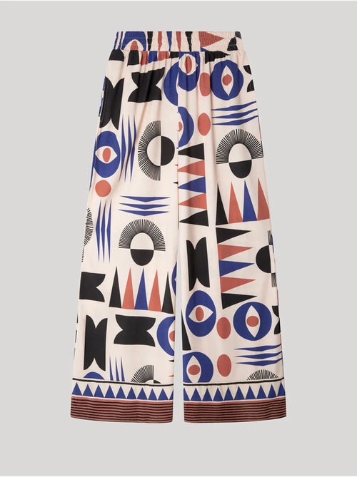 Pantaloni lunghi con motivi geometrici e bordi sul fondo - Kiabi