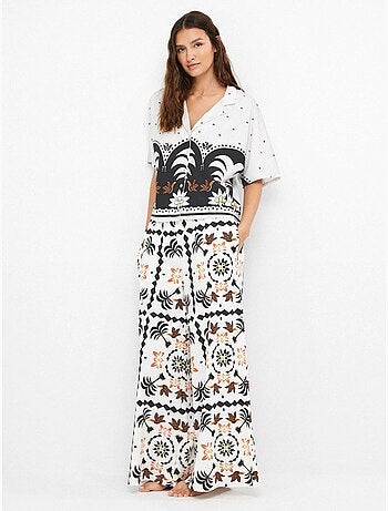 Pantaloni lunghi con stampa tropicale