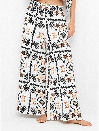Pantaloni lunghi con stampa tropicale