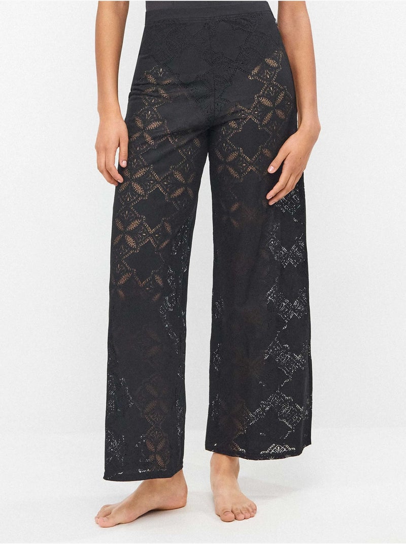 Pantaloni lunghi con trasparenze edizione beach party Nero - Kiabi