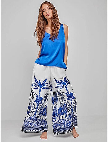 Pantaloni lunghi e larghi con stampa tropicale