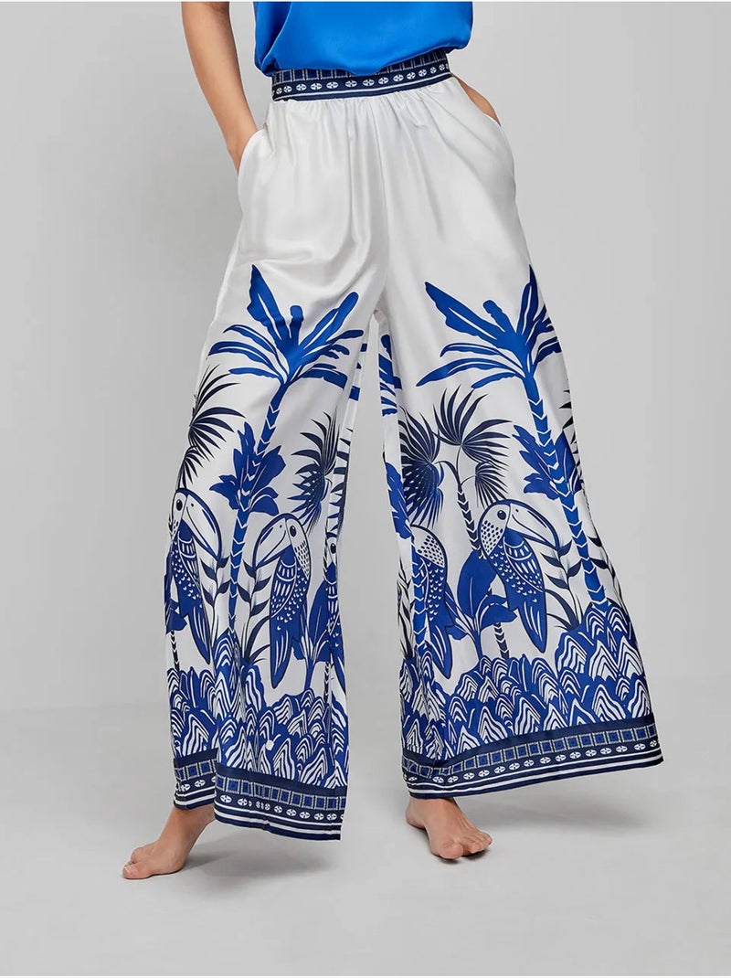 Pantaloni lunghi e larghi con stampa tropicale Multicolore - Kiabi