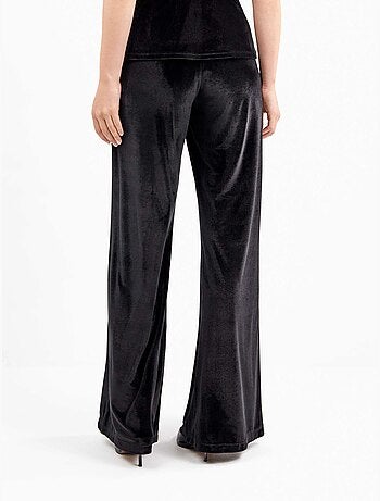 Pantaloni lunghi in velluto elasticizzato con design elegante