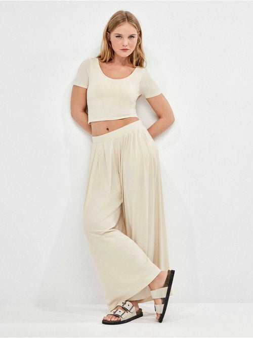 Pantaloni lunghi larghi - Kiabi Pantaloni lunghi larghi - Kiabi