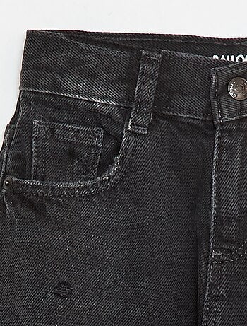 Pantaloni mom fit in denim con abrasioni
