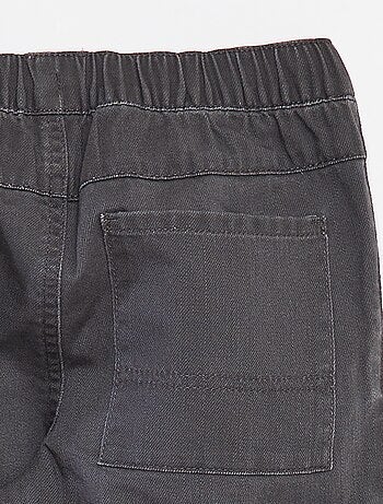 Pantaloni multitasche con vita regolabile