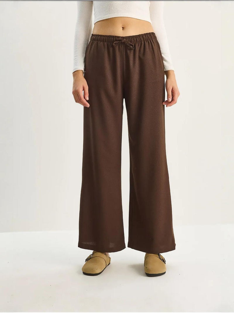 Pantaloni palazzo a gamba ampia con chiusura a laccio lucci Marrone scuro - Kiabi