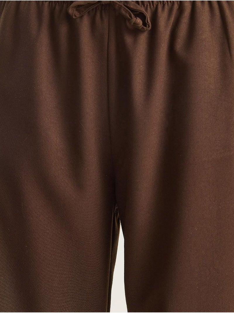 Pantaloni palazzo a gamba ampia con chiusura a laccio lucci Marrone scuro - Kiabi