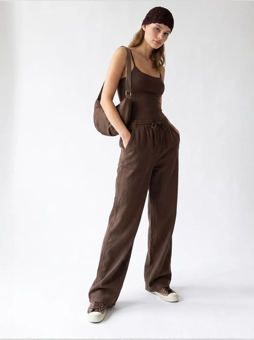 Pantaloni palazzo a gamba ampia in tencel mixray - Kiabi Pantaloni palazzo a gamba ampia in tencel mixray - Kiabi