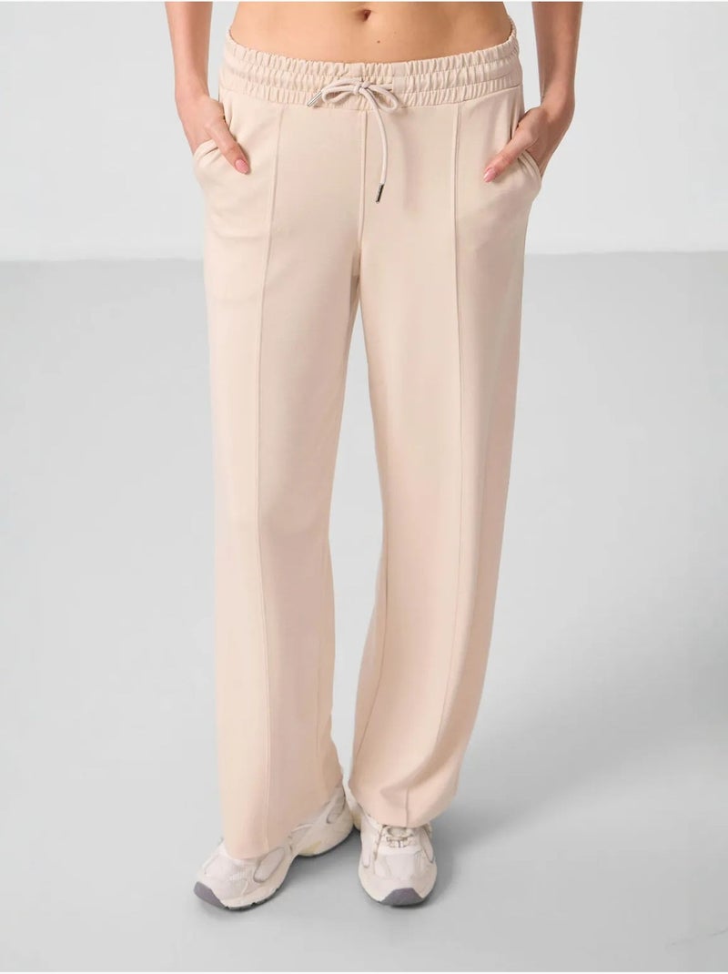 Pantaloni palazzo a gamba ampia testurizzati con vita con coulisse tommy Beige argilla - Kiabi