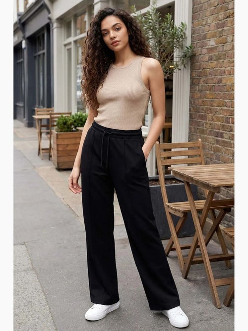 Pantaloni palazzo a gamba ampia testurizzati con vita con coulisse tommy - Kiabi