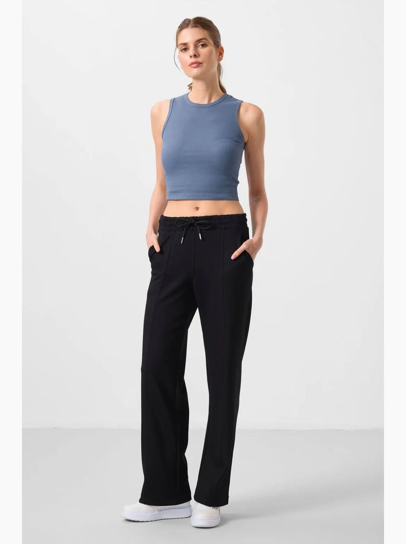 Pantaloni palazzo a gamba ampia testurizzati con vita con coulisse tommy Nero - Kiabi