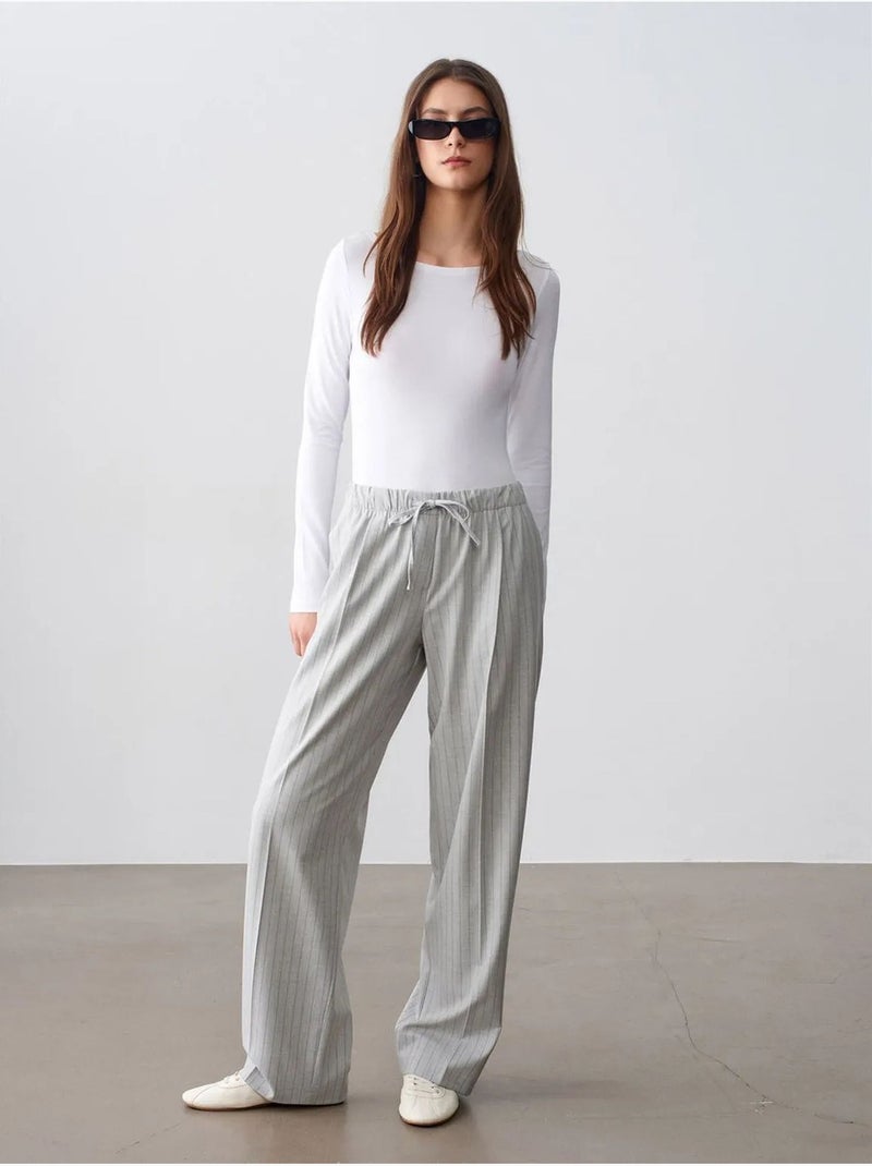 Pantaloni palazzo a righe a gamba ampia dilvin Grigio chiaro - Kiabi