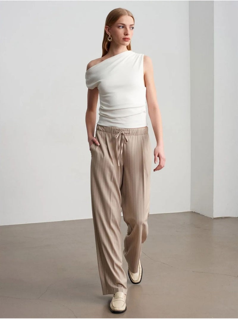 Pantaloni palazzo a righe a gamba ampia dilvin Sabbia - Kiabi