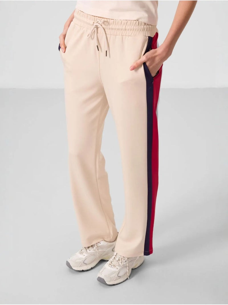 Pantaloni palazzo a righe con vita con coulisse tommy Beige argilla - Kiabi