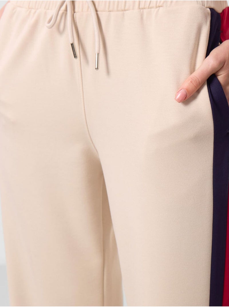 Pantaloni palazzo a righe con vita con coulisse tommy Beige argilla - Kiabi