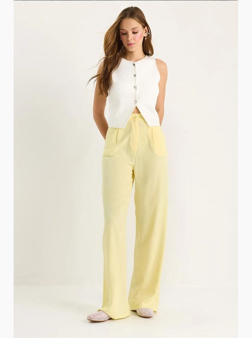 Pantaloni palazzo a vita alta con chiusura a bottoni lucci - Kiabi Pantaloni palazzo a vita alta con chiusura a bottoni lucci - Kiabi