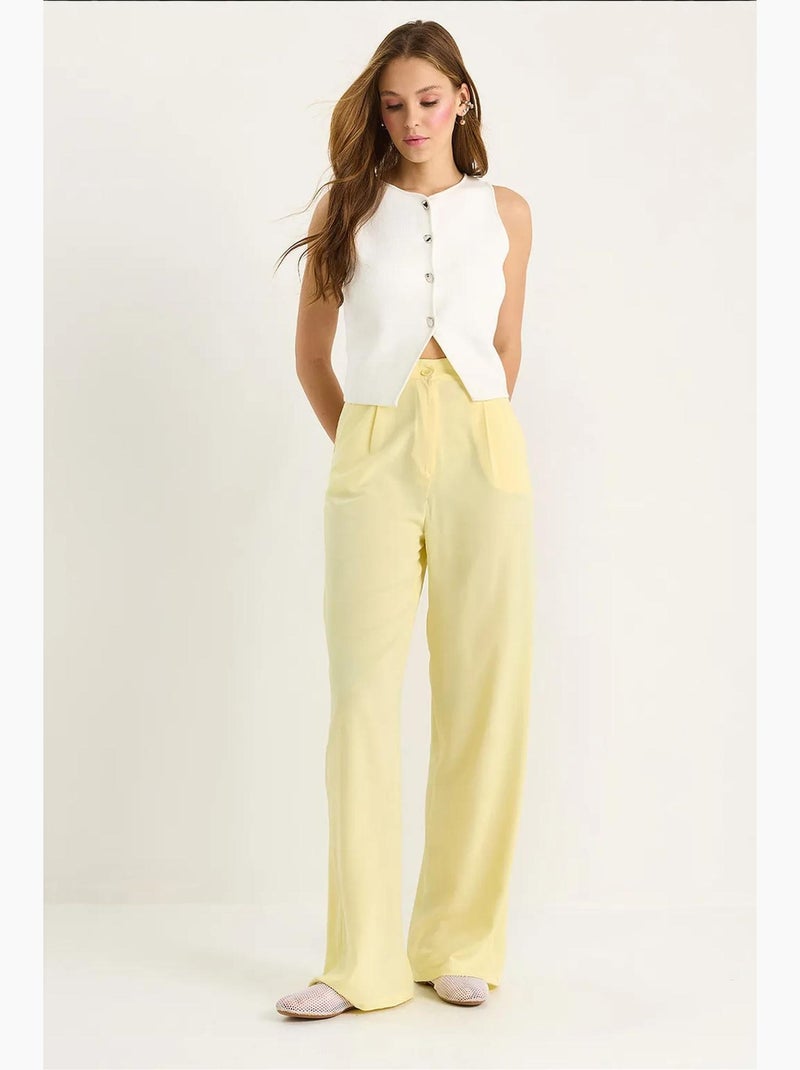 Pantaloni palazzo a vita alta con chiusura a bottoni lucci Giallo limone - Kiabi