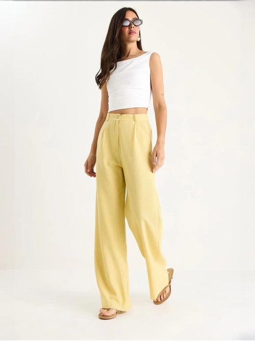 Pantaloni palazzo a vita alta con pieghe lucci - Kiabi Pantaloni palazzo a vita alta con pieghe lucci - Kiabi