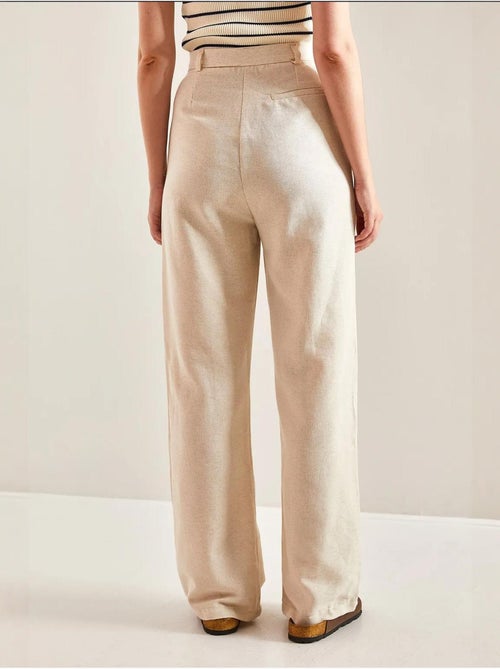 Pantaloni palazzo a vita alta con pieghe lucci - Kiabi Pantaloni palazzo a vita alta con pieghe lucci - Kiabi