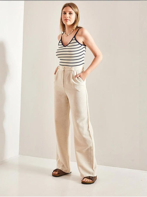Pantaloni palazzo a vita alta con pieghe lucci - Kiabi Pantaloni palazzo a vita alta con pieghe lucci - Kiabi