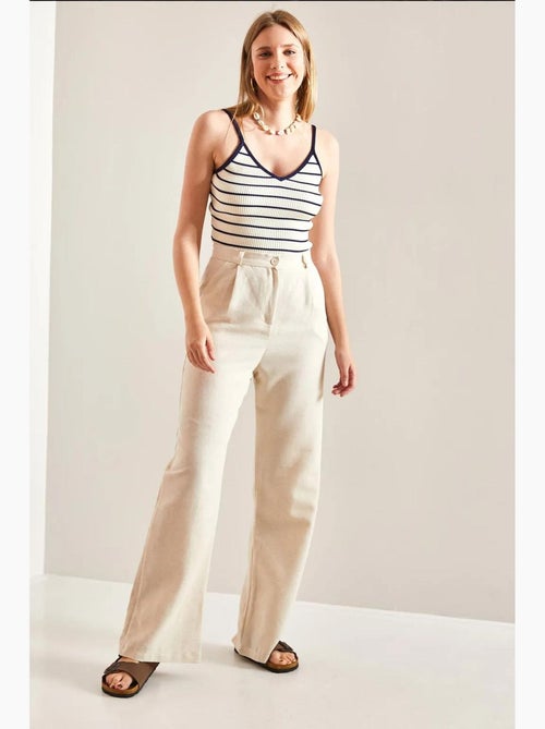 Pantaloni palazzo a vita alta con pieghe lucci - Kiabi Pantaloni palazzo a vita alta con pieghe lucci - Kiabi