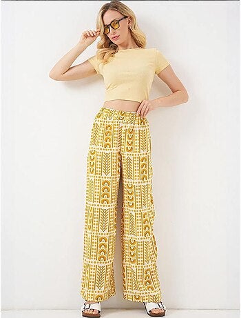 Pantaloni palazzo a vita alta con righe geometriche bdart