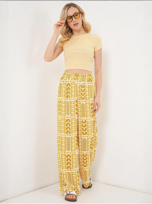 Pantaloni palazzo a vita alta con righe geometriche bdart - Kiabi Pantaloni palazzo a vita alta con righe geometriche bdart - Kiabi
