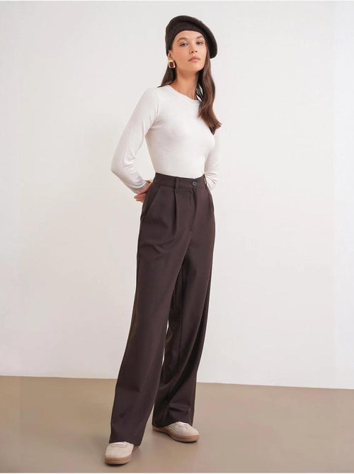 Pantaloni palazzo a vita alta con tasche mixray - Kiabi Pantaloni palazzo a vita alta con tasche mixray - Kiabi