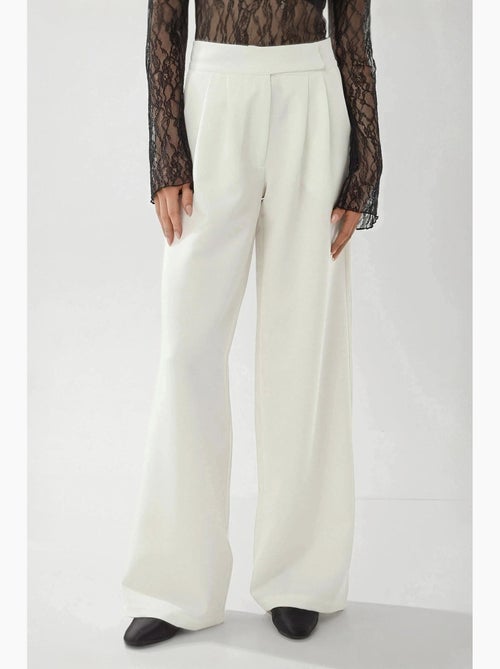 Pantaloni palazzo a vita alta e gamba ampia hiccup - Kiabi Pantaloni palazzo a vita alta e gamba ampia hiccup - Kiabi
