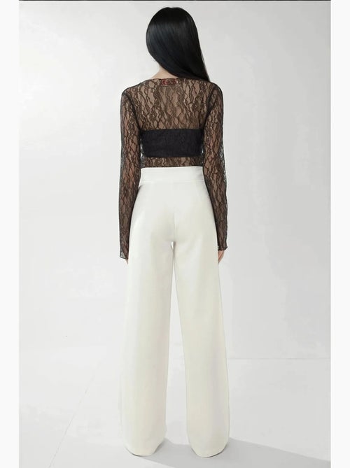 Pantaloni palazzo a vita alta e gamba ampia hiccup - Kiabi Pantaloni palazzo a vita alta e gamba ampia hiccup - Kiabi