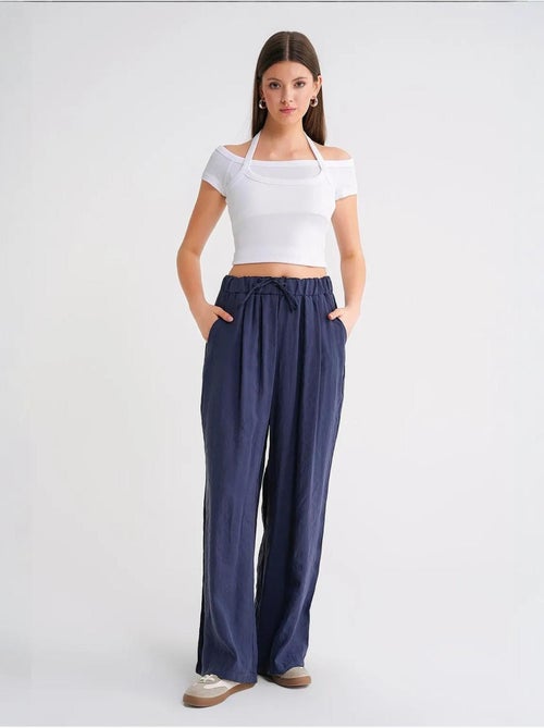 Pantaloni palazzo a vita alta in modal plissettati con coulisse mixray - Kiabi Pantaloni palazzo a vita alta in modal plissettati con coulisse mixray - Kiabi