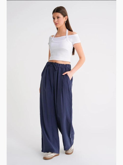 Pantaloni palazzo a vita alta in modal plissettati con coulisse mixray - Kiabi Pantaloni palazzo a vita alta in modal plissettati con coulisse mixray - Kiabi