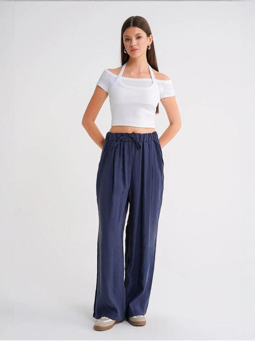 Pantaloni palazzo a vita alta in modal plissettati con coulisse mixray - Kiabi Pantaloni palazzo a vita alta in modal plissettati con coulisse mixray - Kiabi