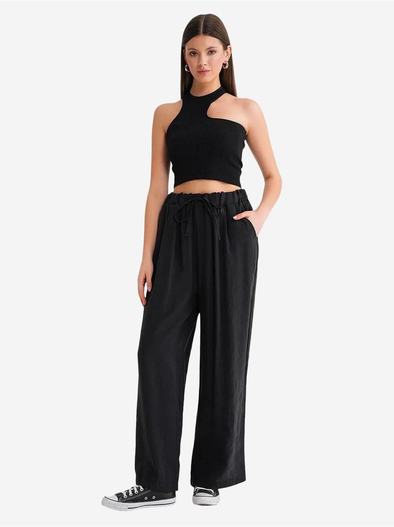 Pantaloni palazzo a vita alta in modal plissettati con coulisse mixray Nero - Kiabi