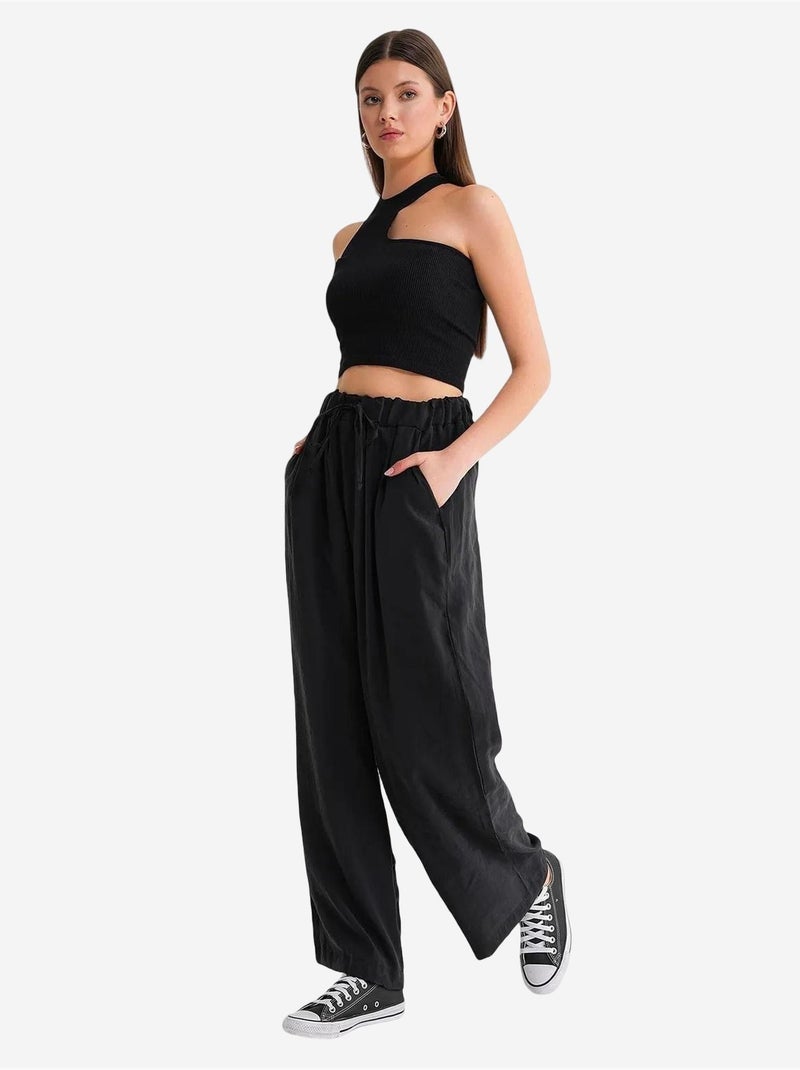 Pantaloni palazzo a vita alta in modal plissettati con coulisse mixray Nero - Kiabi