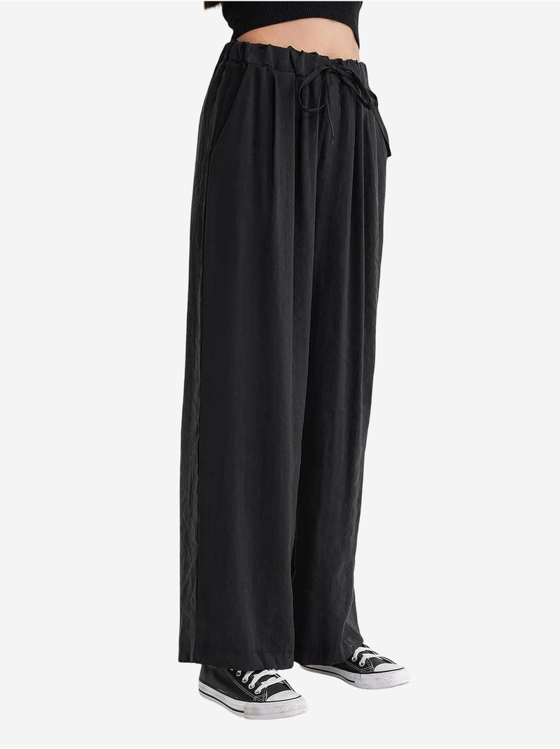 Pantaloni palazzo a vita alta in modal plissettati con coulisse mixray Nero - Kiabi